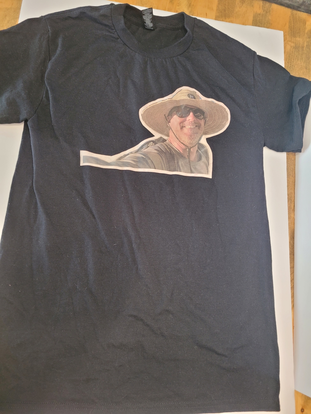 Men's Black Graphic Tee with Sun Hat Portrait
